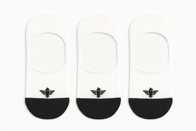 Three pairs of black and white insoles with a logo on a white background
